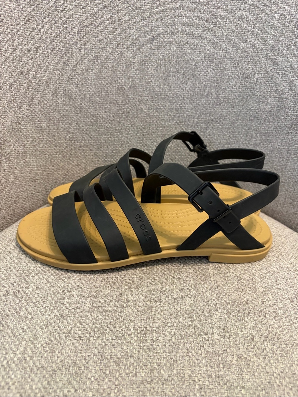 CROCS- Women's size 9 Tulum Sandals in the Black/Tan color combination.